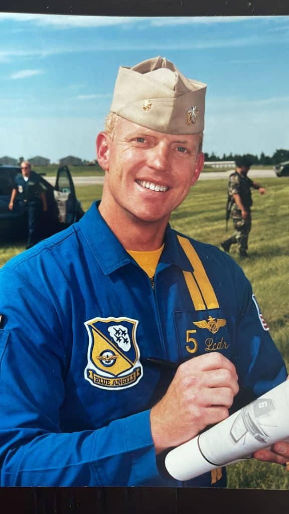 Young Kartvedt while a Blue Angel, signing autographs