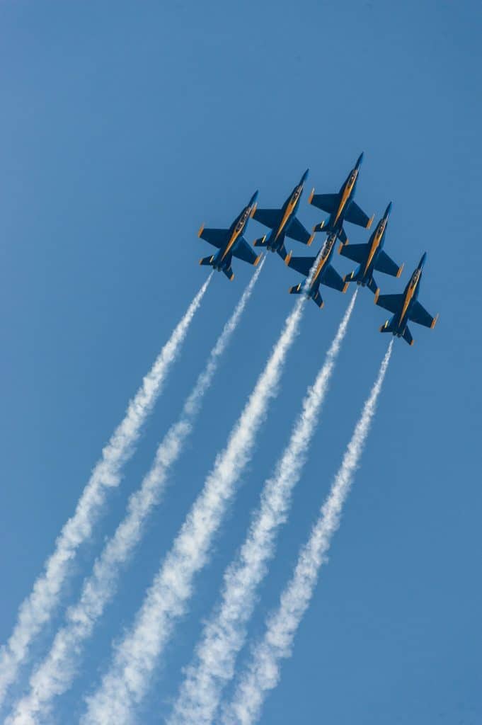 Six US Navy Blue Angel jets in extremely close formation
